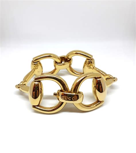 bracciale gucci staffe oro|Altro.